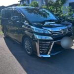 新潟県上越市のほしのじどうしゃに入庫した黒いトヨタ ヴェルファイアの外観
